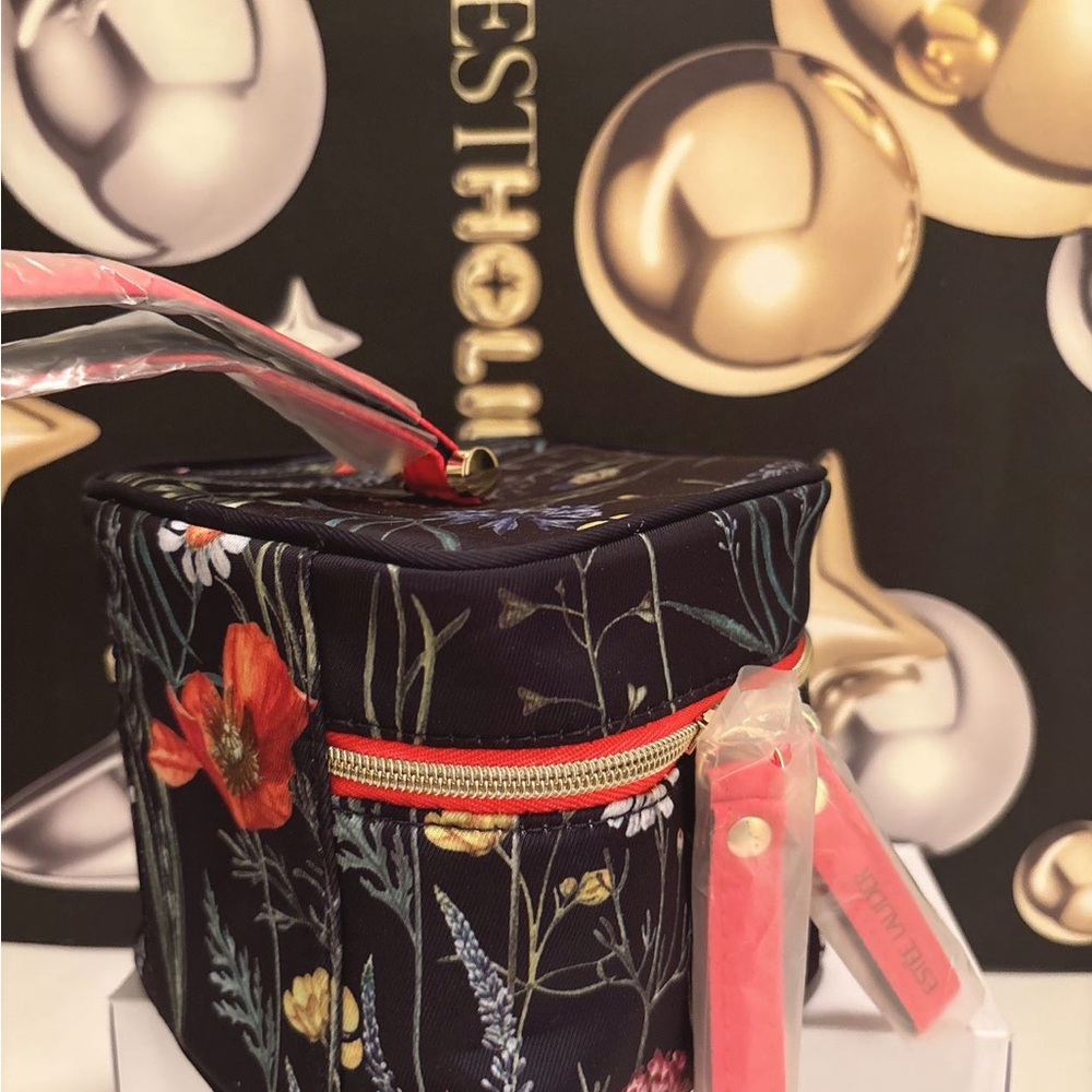 Estee Lauder lip care and lipstick set of seven in a Floral Cosmetic bag